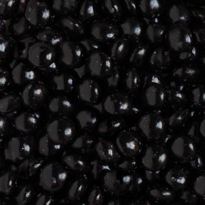 Milchschokoladenperlen/Linsen - Schwarz - 80 g Milchschokoladenperlen/Linsen - Schwarz - 80 g