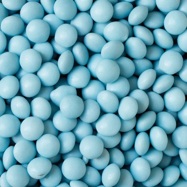 Milchschokoladenperlen/Linsen - Hellblau - 80 g Milchschokoladenperlen/Linsen - Hellblau - 80 g