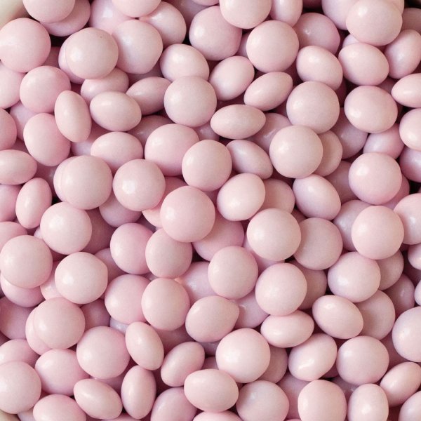 Milchschokoladenperlen/Linsen - Rosa - 80 g Milchschokoladenperlen/Linsen - Rosa - 80 g